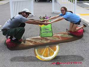 Bread and fruit teeter totter 3D pavement art