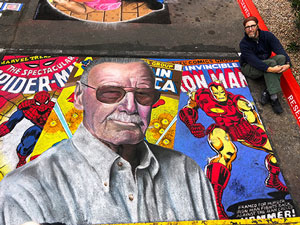 Posing with Stan Lee Marvel tribute pavement art