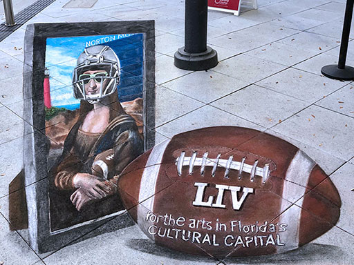 3D Mona Lisa in a football helmet chalk art