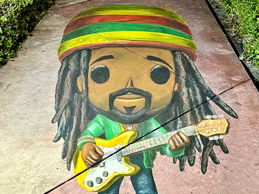 3D chalk art of Bob Marley in Funko Pop style.